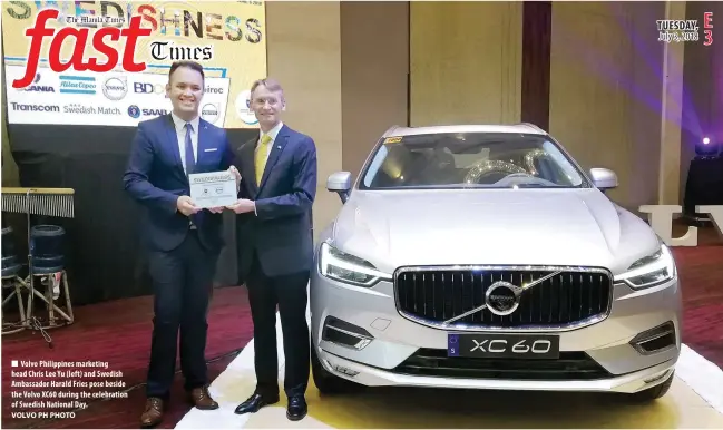  ?? VOLVO PH PHOTO ?? Volvo Philippine­s marketing head Chris Lee Yu (left) and Swedish Ambassador Harald Fries pose beside the Volvo XC60 during the celebratio­n of Swedish National Day.