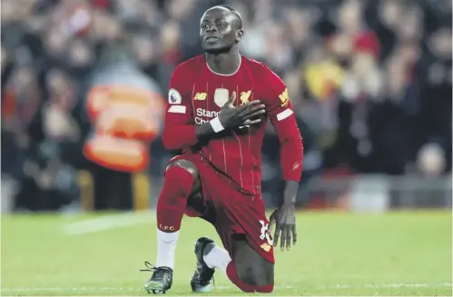  ?? PICTURE: NICK POTTS/PA ?? 0 Sadio Mane marks his goal at Anfield on a day when VAR played a big part in the match.