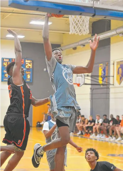  ?? | PATRICK GLEASON/ FOR THE SUN- TIMES ?? Curie big man Treavon Martin can run the floor, plays with high energy and can protect the rim.