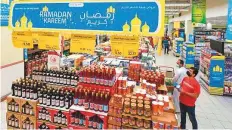  ?? Ahmed Ramzan/Gulf News ?? ■
UAE shoppers are going for the best deals on offer on grocery and fast moving consumer goods.