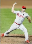  ?? PATRICK SEMANSKY/THE ASSOCIATED PRESS ?? Philadelph­ia Phillies outfielder Jeff Francoeur throws to the Baltimore Orioles in the eighth inning on Tuesday.