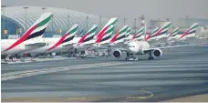  ?? AFP ?? Emirates airline and the airport coped with a cut in capacity for repairs in 2014