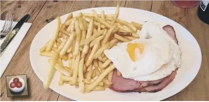  ??  ?? A fair old portion... ham, egg and chips at the Square Cow and, inset, the game-changing gizmo of glee.