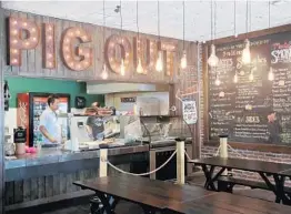  ?? MIKE STOCKER/SUN SENTINEL PHOTOS ?? The new Smoke BBQ in Boca Raton, expected to open in October 2018 at 555 N. Federal Hwy., will be similar in size and vibe as the Fort Lauderdale location (pictured).