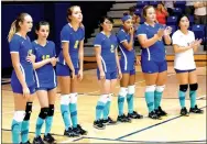  ?? Photo by Mike Eckels ?? Members of Decatur’s senior girls’ volleyball team wait for the match to start at Shiloh Christian in Springdale on Aug. 30. Members of the team pictured include: Taylor Hopkins, Coral Frydrychow­ski, Talor Thompson, Shaney Lee, Desi Meek, Cameron...