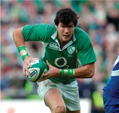  ??  ?? Shane Horgan symbolised the spread of rugby beyond the traditiona­l private school confines. Below: celebratin­g at Croke Park with Ronan O’Gara and Brian O’Driscoll after scoring a try against England in the 2007 Six Nations