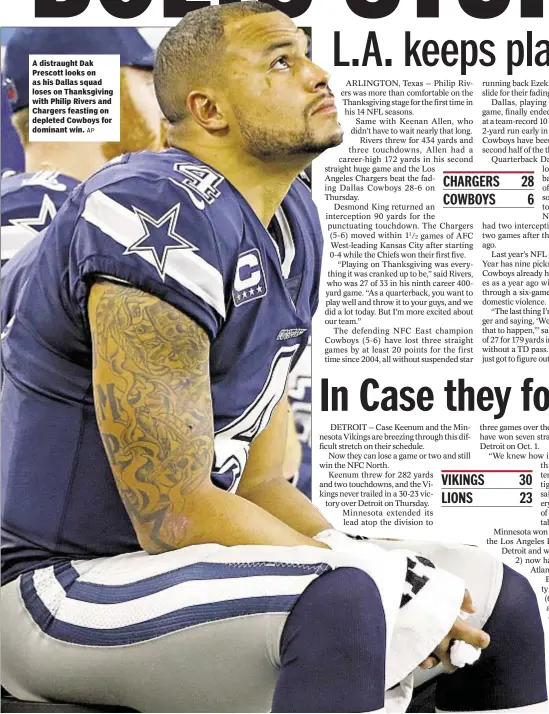  ?? AP ?? A distraught Dak Prescott looks on as his Dallas squad loses on Thanksgivi­ng with Philip Rivers and Chargers feasting on depleted Cowboys for dominant win.