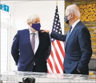 ?? Patrick Semansky Associated Press ?? PRESIDENT BIDEN and British Prime Minister Boris Johnson, who has been called the “British Trump,” reached agreement on several issues despite some Brexit-related tension.