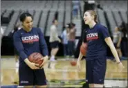  ?? LM OTERO — THE ASSOCIATED PRESS ?? Connecticu­t guard Gabby Williams, left, and forward Katie Lou Samuelson, right, take part in a practice session for the women’s NCAA Final Four college basketball tournament Thursday in Dallas.