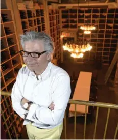  ?? AARON HARRIS FOR THE TORONTO STAR ?? Arron Barberian in the 39,000-bottle wine cellar at Barberian’s Steakhouse.