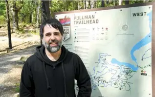  ?? The Sentinel-Record/Tanner Newton ?? ■ Sonny Kay, executive director of Low Key Arts, stands at the Pullman Trailhead, which is where LKA will lead a group hike in May.