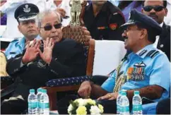  ??  ?? President of India Pranab Mukherjee and Chief of the Air Staff, Air Chief Marshal Arup Raha, sharing a lighter moment during President’s Standard presentati­on at Air Force Station in Ambala