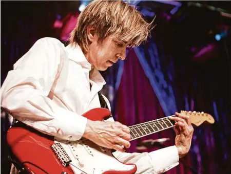  ??  ?? Austin guitarist Eric Johnson earned a following with the ’70s band Electromag­nets. Max Crace