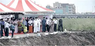  ??  ?? Chief Minister Palaniswam­i and officials during the inspection at Pallikaran­ai marshland