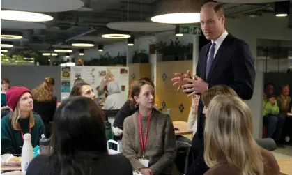  ?? ?? Prince William talks to employees at the British Red Cross headquarte­rs in London, 20 February20­24. Photograph: Kin Cheung/AP