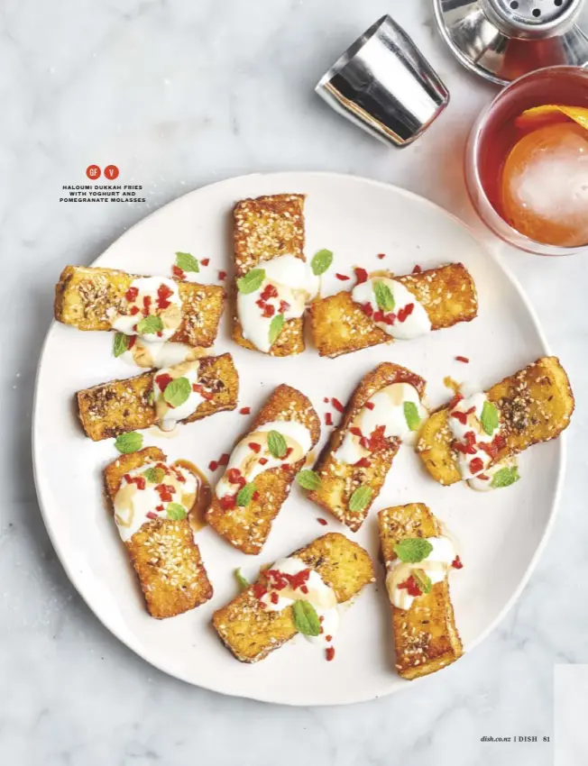  ??  ?? HALOUMI DUKKAH FRIES WITH YOGHURT AND POMEGRANAT­E MOLASSES