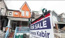  ?? TYLER ANDERSON ?? Bidding wars are driving up housing prices beyond Toronto, in Ontario communitie­s such as Guelph, Hamilton and Kitchener.