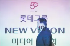  ??  ?? Hwang Kag-gyu, head of Lotte Corporate Innovation Office, attends a news conference in Seoul, South Korea, April 3. South Korea’s Lotte Group will continue to invest in its China business despite diplomatic tensions over the deployment of a US missile...