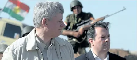  ?? SEAN KILPATRICK/CP FILES ?? Former prime minister Stephen Harper and former defence minister Jason Kenney visit Iraq in this May 2015 file photo. With Harper resigning from the House of Commons and Kenney committed to doing so before October, Calgary is set to lose two powerful...