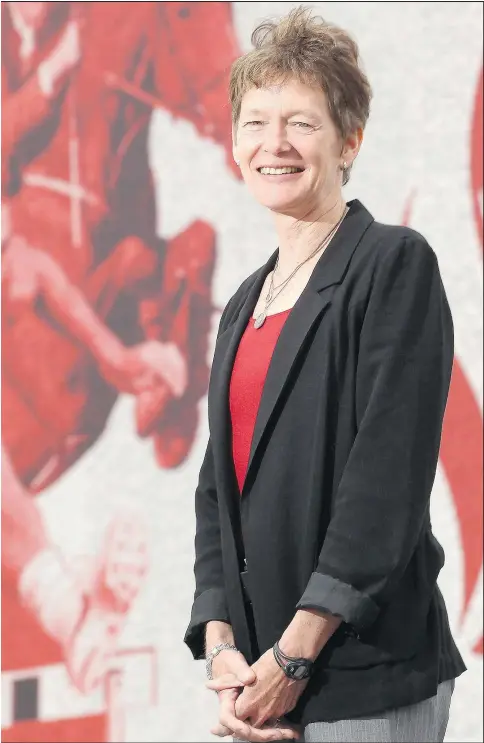  ?? STUART GRADON/POSTMEDIA NETWORK FILES ?? Own the Podium chief Anne Merklinger, posing outside Canada’s Sports Hall of Fame in Calgary, says topping the medal totals won at Vancouver and Sochi would qualify the Korea Games next month a success.