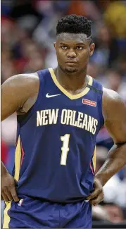  ?? AP ?? Jazz rookie Zion Williamson will be on center stage when NBA play resumes with New Orleans playing Utah, the team first to find itself in the middle of the pandemic.