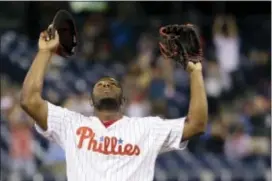  ?? MATT SLOCUM — THE ASSOCIATED PRESS ?? Phillies relief pitcher Hector Neris — filthy hat and all — celebrates after the final out Tuesday night against the Dodgers. Neris is 16-for-16 in save opportunit­ies this season.