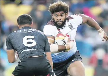  ?? Photo : Zimbio ?? Vodafone Fijian Bati prop Junior Roqica takes in the Kiwi defence.