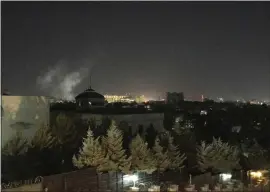  ?? CARA ANNA — THE ASSOCIATED PRESS ?? A plume of smoke rises near the U.S. Embassy in Kabul, Afghanista­n, on Wednesday. A blast was heard shortly after midnight on the anniversar­y of the 9/11attacks.