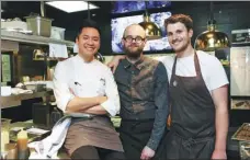  ?? PHOTOS PROVIDED TO CHINA DAILY ?? A window with a view of a gate of the Ming Dynasty Forbidden City at TRB Forbidden City restaurant in Beijing. Right: French chef Johnny Pham (left) with guest chefs at the Beijing restaurant.