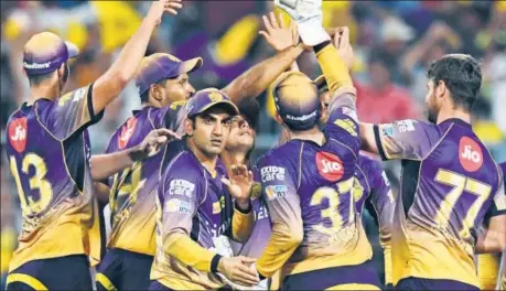  ?? AFP PHOTO ?? KKR captain Gautam Gambhir (centre)’s threat at the dinner break seemed to have worked for the team.