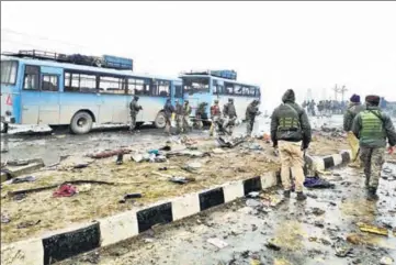  ?? REUTERS ?? At least 44 CRPF personnel are feared dead after a Jaish suicide bomber rammed a vehicle carrying over 100 kg of explosives into their bus in Pulwama district on Thursday.