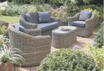  ??  ?? OUTDOORS: A lovely garden is a selling point. Pictured is furniture by Bridgman.