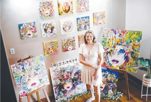  ?? Picture: Danni Johnson ?? Maggie O’Hara in her studio with paintings that she turned into her Faces of the Forest cards.