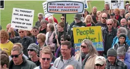  ??  ?? Above: More than a thousand people marched in Westport in 2017 to protest the proposed Buller Integrated Family Health Centre. They wanted a ‘‘fit for purpose’’ hospital instead.
Above right: Westport’s Buller hospital is being replaced by a 10-bed Integrated Family Health Centre.