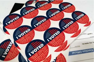  ?? AP PHOTO ?? STICKY SITUATION
‘I Voted’ stickers are seen before being offered to voters after casting their Super Tuesday primary ballots at the Ranchito Elementary School polling station in the Panorama City section of Los Angeles, California, on Tuesday, March 5, 2024.