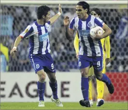  ??  ?? Joao Moutinho et Falcao sous le maillot de Porto.