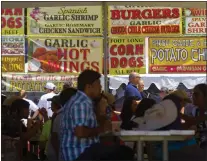  ?? ?? A variety of garlic-flavored foods were offered during the Gilroy Garlic Festival in 2016in Gilroy.