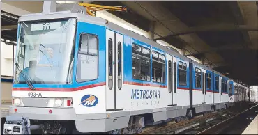  ??  ?? MRT-3 train plying the EDSA route.