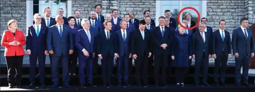  ??  ?? Spot the PM: Theresa May, circled, on the end of the back row in a photograph of EU leaders in Tallinn, Estonia, yesterday