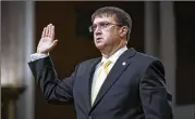  ?? ERIN SCHAFF / THE NEW YORK TIMES ?? Robert Wilkie, President Donald Trump’s pick to lead the Department of Veterans Affairs, is sworn in at Wednesday’s confirmati­on hearing before the Senate Veterans’ Affairs Committee in Washington.