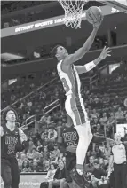  ?? OSENTOSKI/USA TODAY SPORTS
RICK ?? Pistons guard Jaden Ivey goes to the basket in the first half against the Nets at Little Caesars Arena on Thursday night.