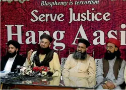  ?? AP ?? Ashraf Asim Jalali, second from left, the leader of Pakistan’s Tehreek-e-Labbaik religious party, addresses a news conference with others regarding the acquittal of Christian woman Asia Bibi, in Lahore.