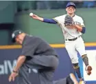  ?? JEFFREY PHELPS/ASSOCIATED PRESS ?? Luis Urias has made six starts at third base for the Brewers this season.