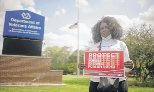  ?? PAT NABONG/SUN-TIMES PHOTOS ?? Beverly Miles, a COVID-19 survivor, veteran and nurse at Edward Hines Jr. VA Hospital, took part in a rally last week seeking sufficient personal protective equipment and safer working conditions.