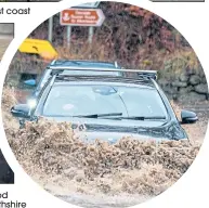  ??  ?? Waves at Saltcoats as Storm Dennis pounds Scotland’s west coast
The Royal Regiment of Scotland 4th Battalion help with flood defences in Yorkshire; right, flooding at Bridge of Cally, Perthshire