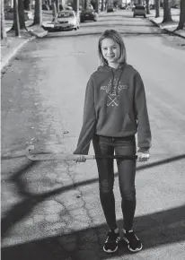  ?? MATT ROURKE/ASSOCIATED PRESS ?? Rebekah Bruesehoff, 14, poses Friday in Cherry Hill, N.J. The transgende­r teenager competes on her middle school field hockey team and hopes to keep playing in high school. ‘It’s all been positive,’ she said. ‘The coaches have been really helpful.’