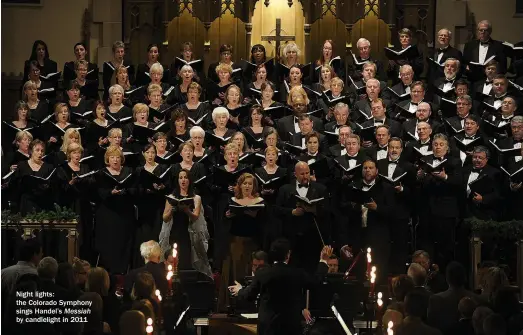  ??  ?? Night lights: the Colorado Symphony sings Handel’s Messiah by candleligh­t in 2011