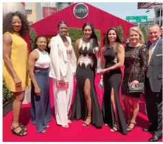  ?? (Submitted photo) ?? Members of the Mississipp­i State women’s basketball team Chinwe Okorie, from left, Morgan William, Breanna Richardson, Victoria Vivians, Dominique Dillingham, Blair Schaefer and coach Vic Schaefer show off their ESPY for Best Upset on the red carpet in...