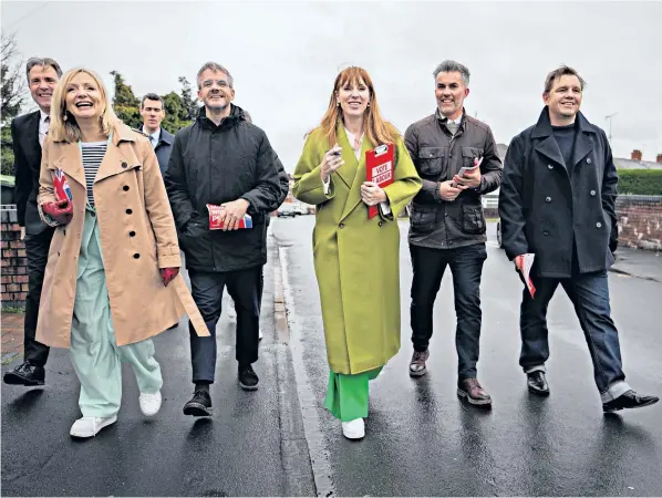  ?? ?? Angela Rayner (centre) campaigns in Birmingham yesterday with Tracy Brabin, the mayor of West Yorkshire, and fellow labour mayoral candidates before the local elections in May
