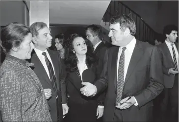  ?? RILLON/AFP ?? French writer, journalist and movie producer Claude Lanzmann (right) speaks with Simone Veil (left) and others at a screening of the film Shoah at the Theatre de L’Empire in Paris on April 21, 1985.